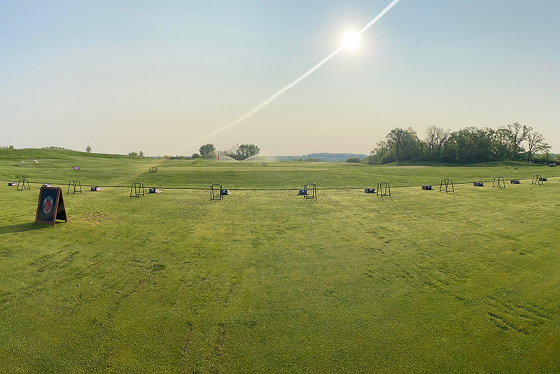 A wide shot of the greens in the practice area